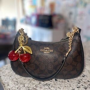 Cherry charm. Bag not included.